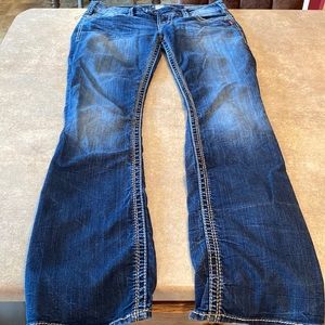 Women’s silver slim boot, cut jeans size 27, length 31